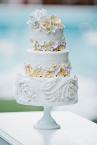 white wedding cake with ruffles and flowers Sweet Things by Fi